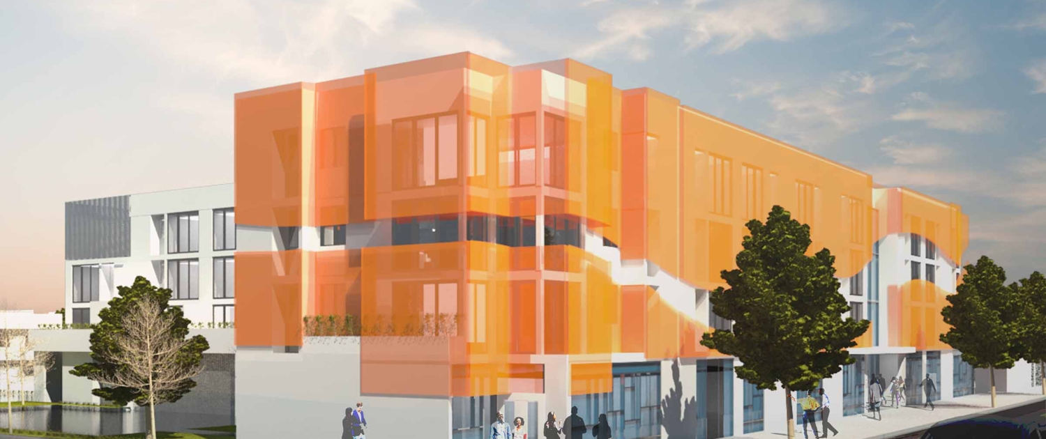 Coming Soon: Manchester Urban Homes. Corner angle of building with orange facade and people gathering at the ground level.