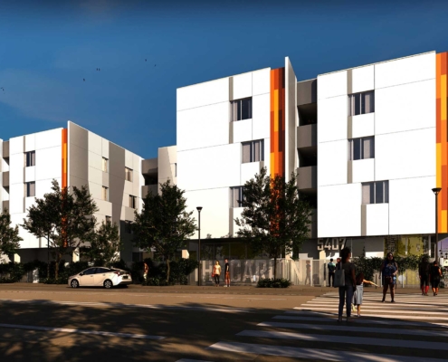 Now Leasing: The Carlton, a multifamily building with three and four levels above grade. White and orange exterior.